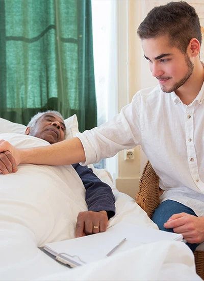 Nurse comforting hospice patient in Sparks, TX