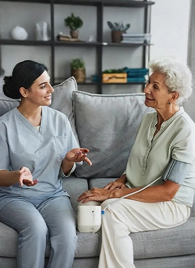 Nurse talking about home health in Mesilla, NM to an elderly woman.