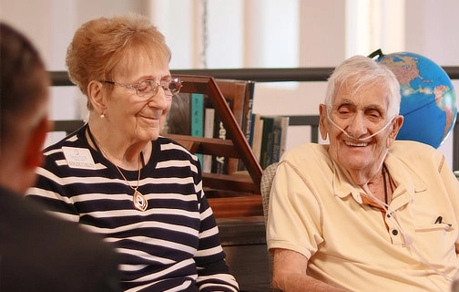 Volunteer with elderly woman in El Paso.